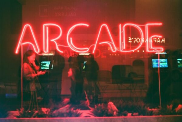 Neon arcade gaming aesthetic representing the GameFi token surge