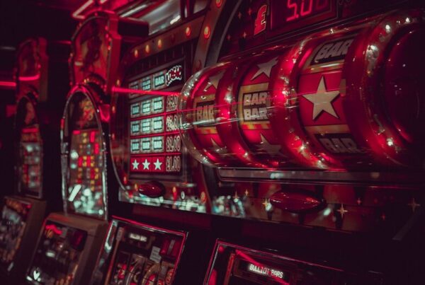 Casino slot machine neon lights - representing crypto gambling platforms