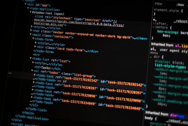 Programming code displayed on a dark monitor, representing the code repository reached in the fake job interview attack