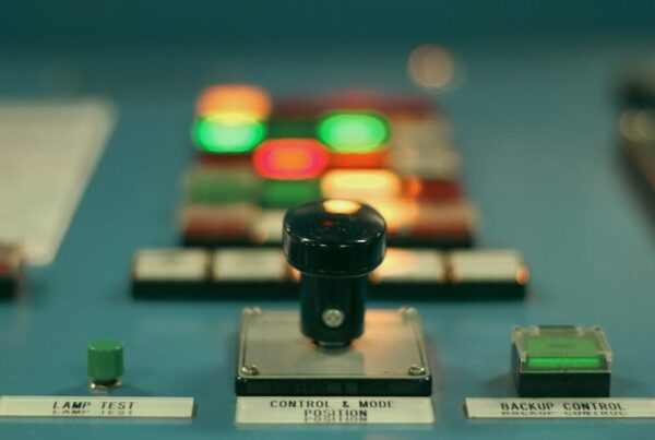 Close-up of an industrial control panel with switches